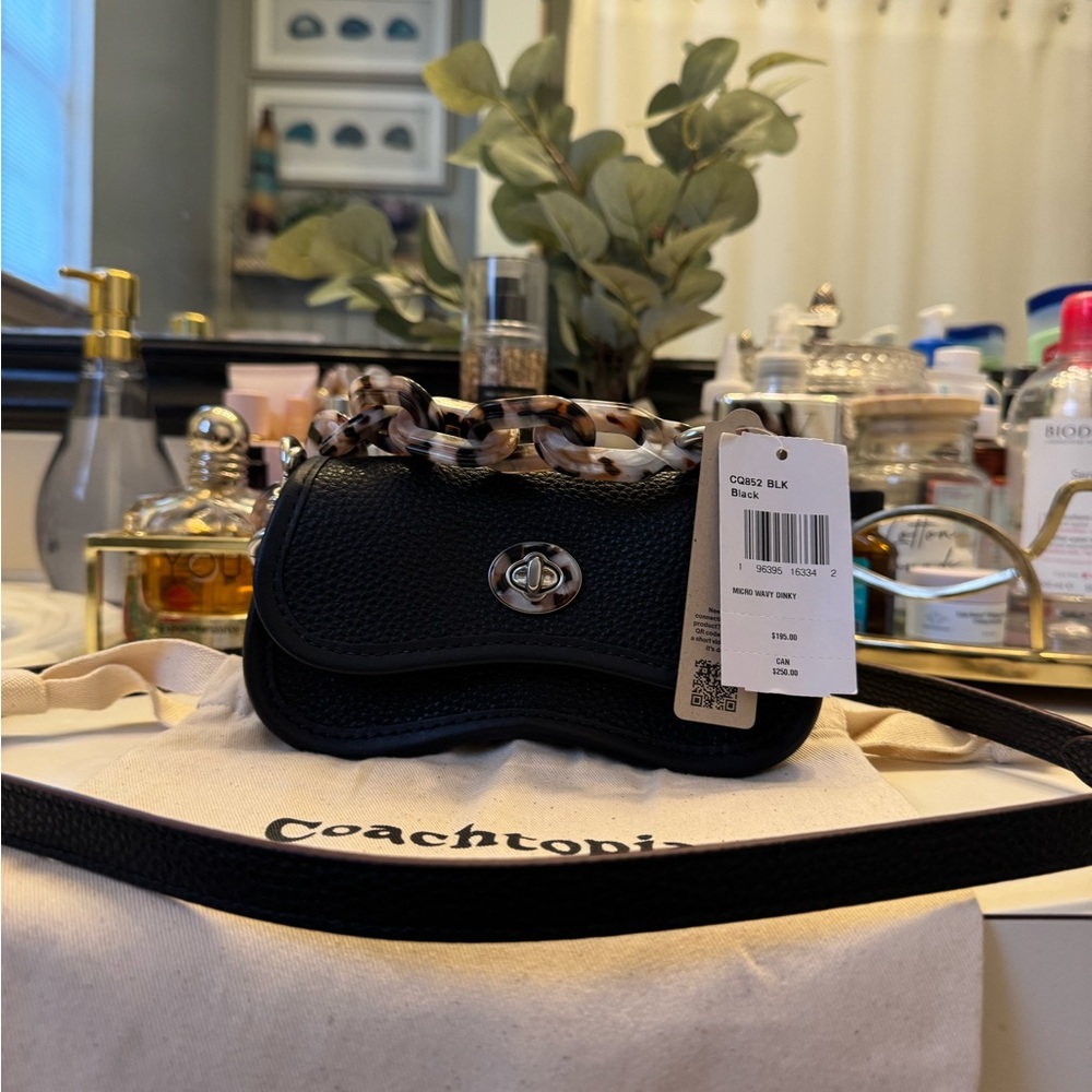 Coach Mini Wavy Dinky Bag In Coachtopia Leather